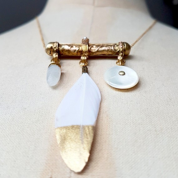 Striking white feather gold dipped and antique button necklace