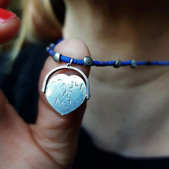 Forget Me Not Silver Spinning Charm Necklace